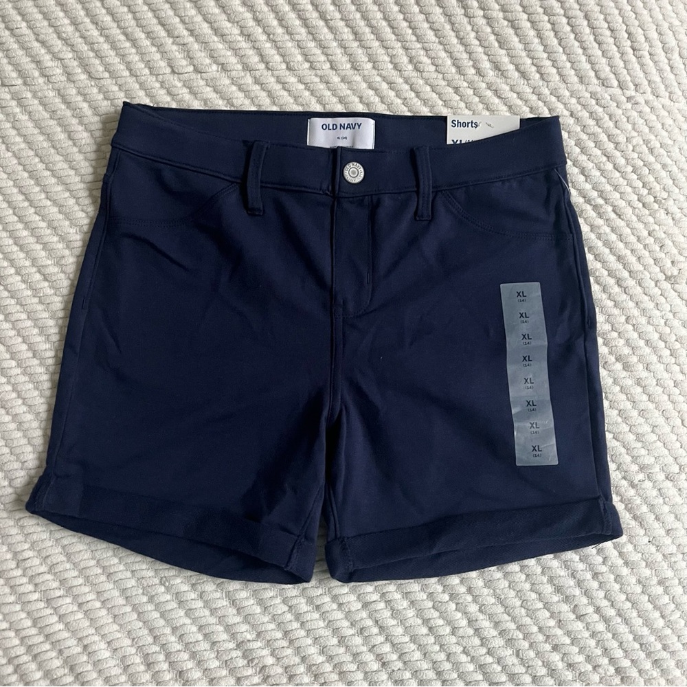 Navy blue shorts.